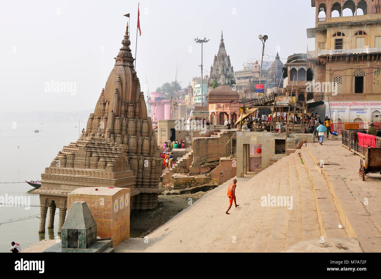 Manikarnika ghat (a cremation spot) along the Ganges river banks, Varanasi, India Stock Photo