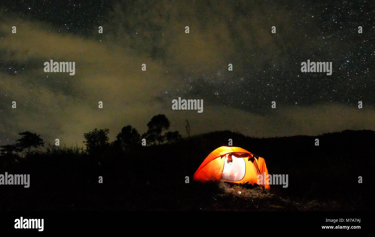 Camping Under Beautiful Night Sky With Millions Of Stars In Rakutak Mountains Stock Photo