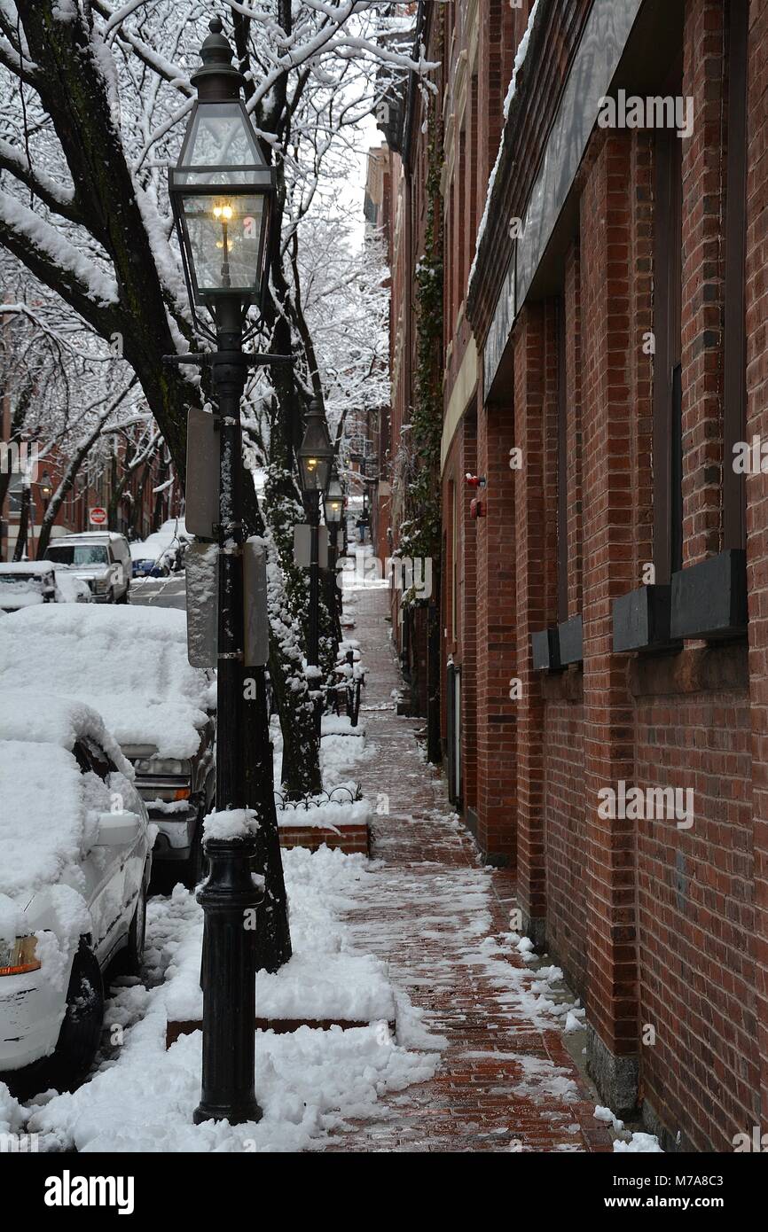 Brick homes and gas street lamps in Beacon Hill in downtown Boston after a Nor'Easter storm