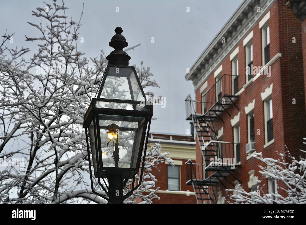 Brick homes and gas street lamps in Beacon Hill in downtown Boston after a Nor'Easter storm