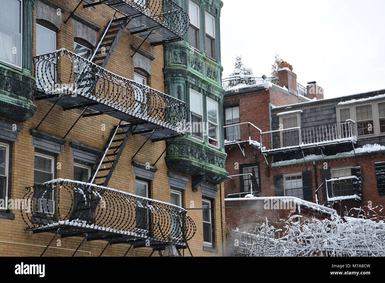 Brick homes and gas street lamps in Beacon Hill in downtown Boston after a Nor'Easter storm