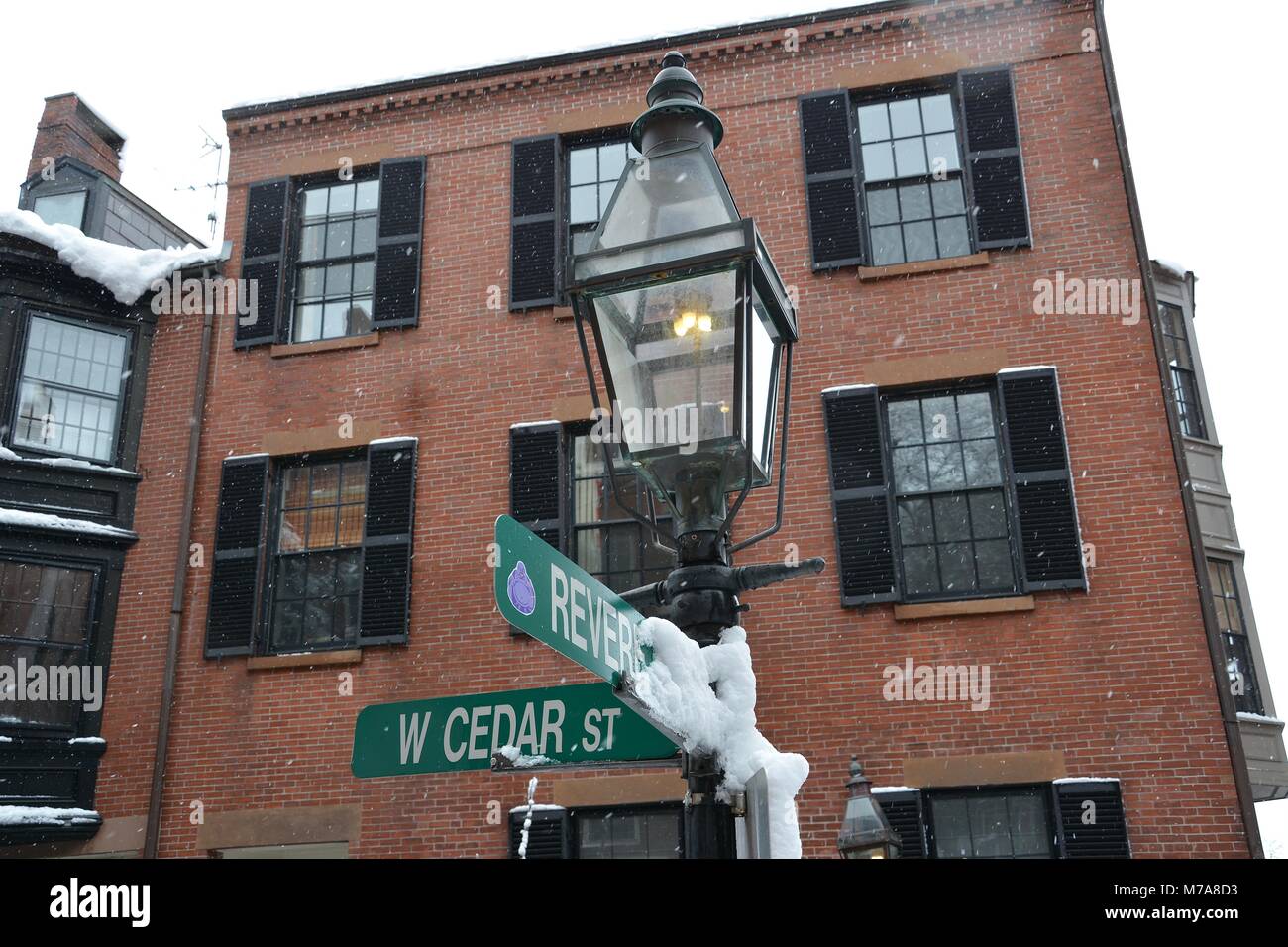 Brick homes and gas street lamps in Beacon Hill in downtown Boston after a Nor'Easter storm