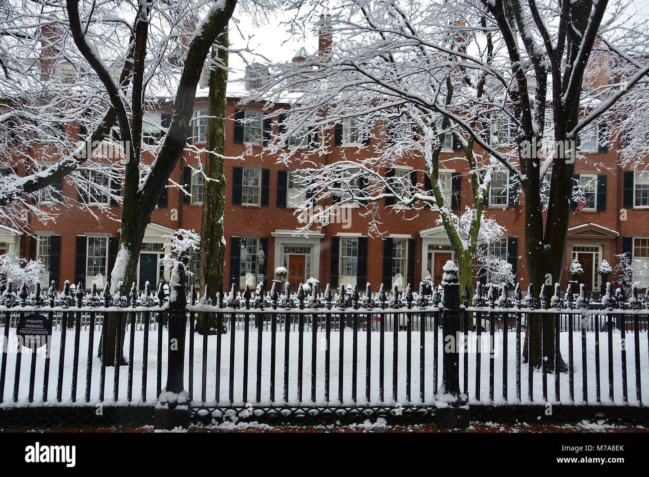 Homes and cast iron fencing along Louisburg Square on Beacon Hill in