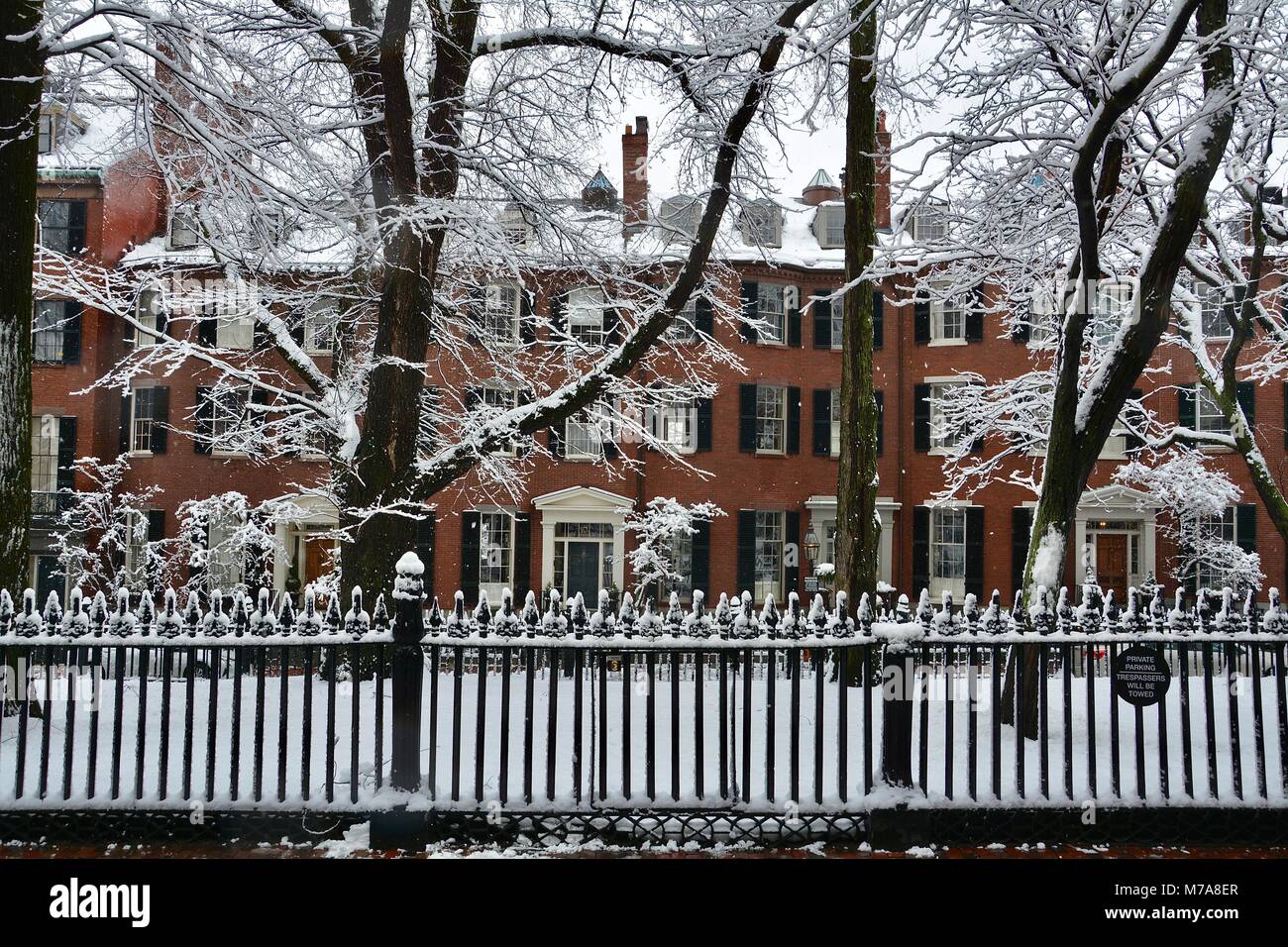 Homes and cast iron fencing along Louisburg Square on Beacon Hill in