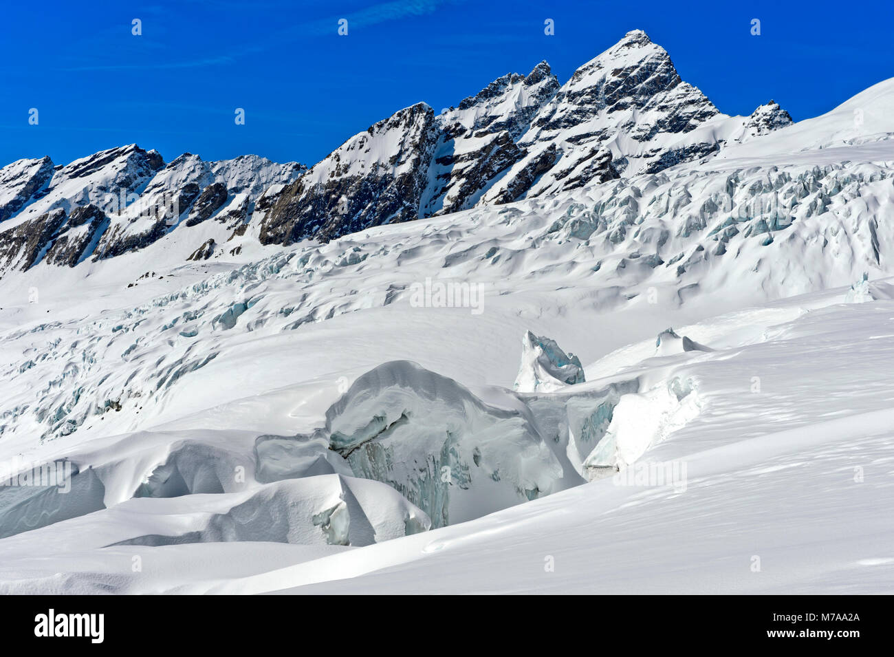 Seracs, towers of glacier ice and crevasses, Lang Glacier, Lötschental, Valais, Switzerland Stock Photo