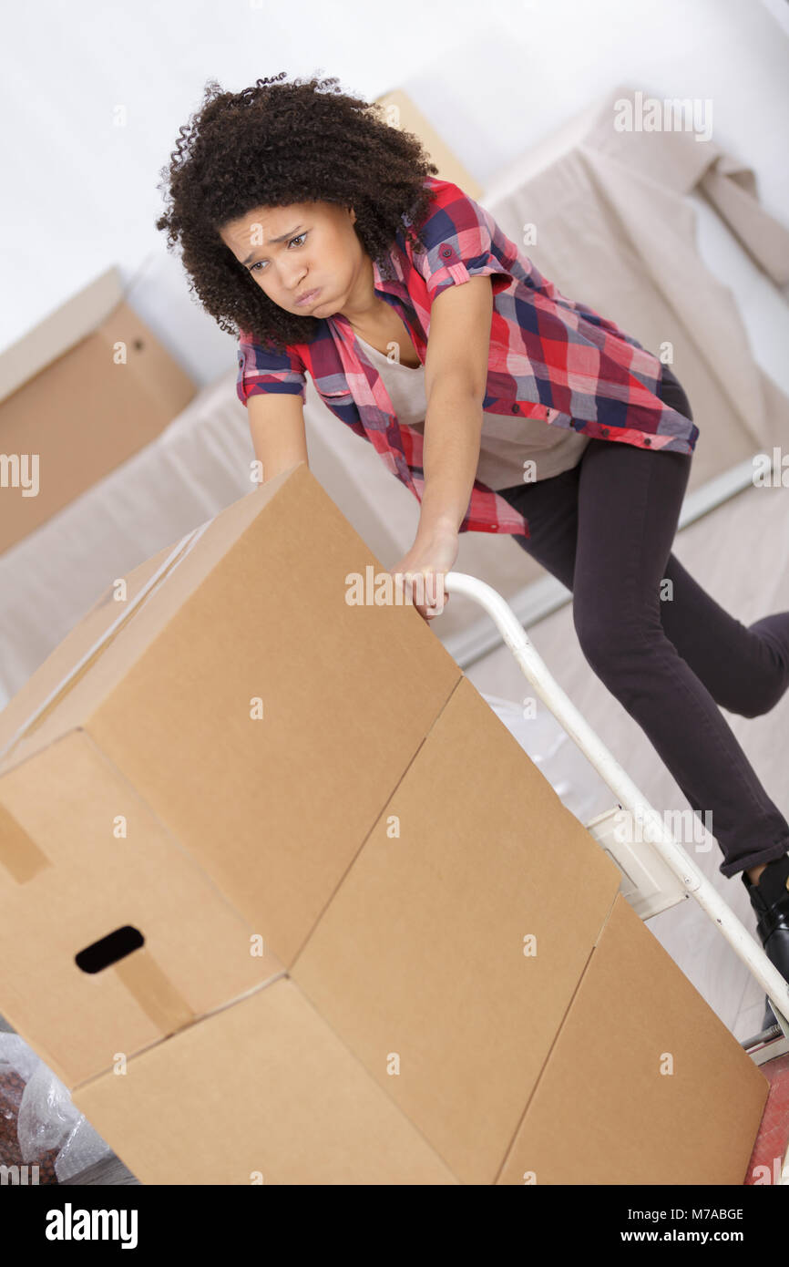 Warehouse pushing trolley hires stock photography and images Alamy