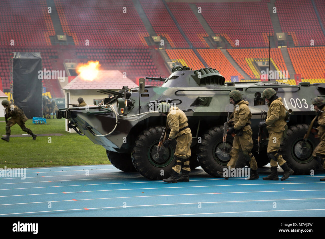 Armored personnel carrier firing on demonstration maneuvers of police special forces to eliminate terrorists in Luzhniki football stadium in Moscow Stock Photo
