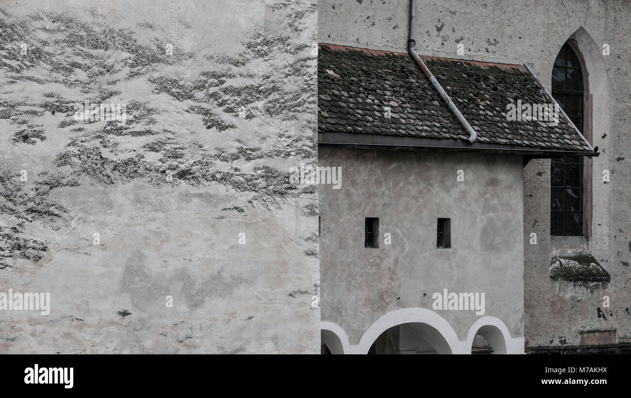 Church wall and church window, Schluderns, South Tirol Stock Photo