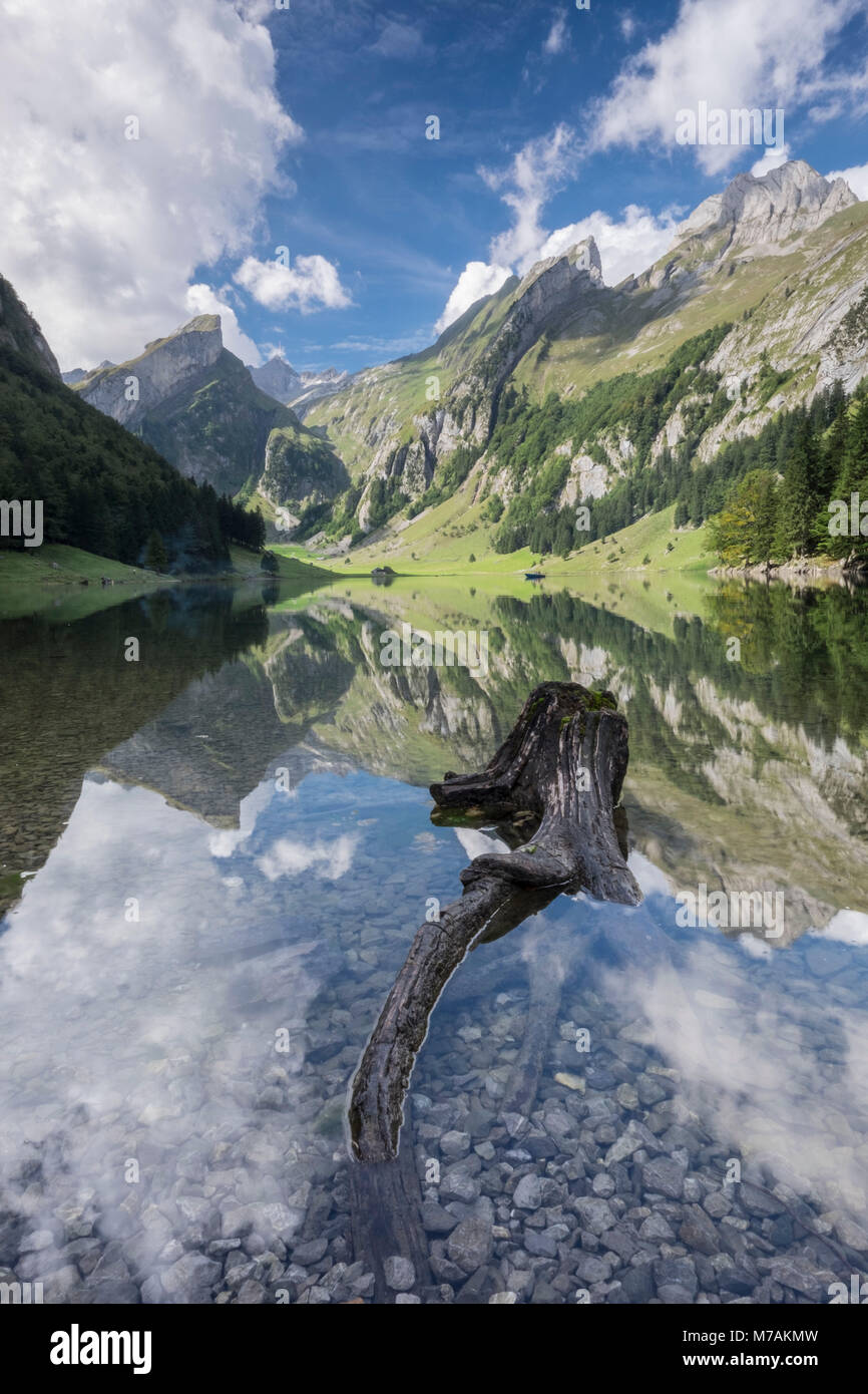 Europe, Switzerland, Appenzell, root in the sea Alpsee, mountains, cloudy sky, reflexions, Stock Photo