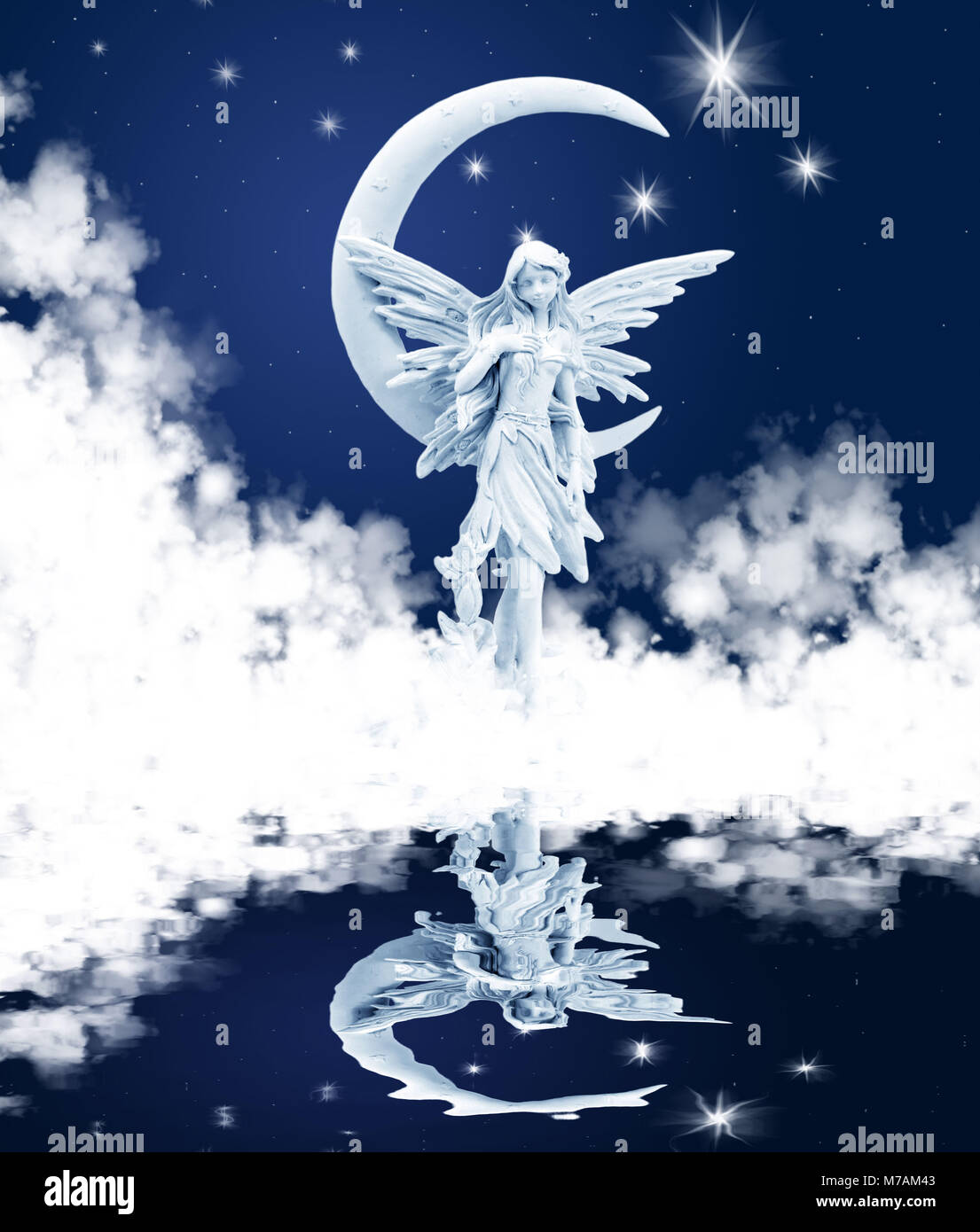 Angel with crescent moon Stock Photo - Alamy