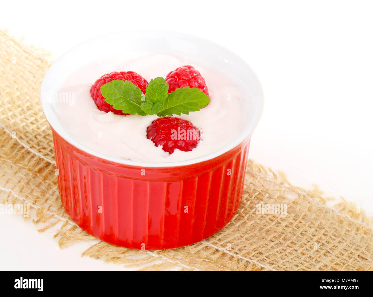 Dessert bowl with raspberries Stock Photo
