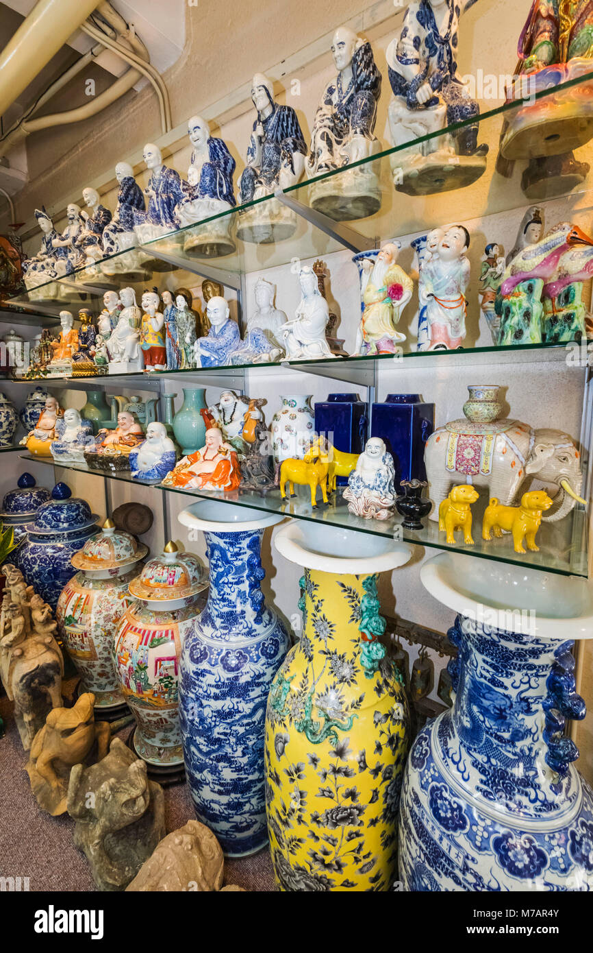 China, Hong Kong, Central, Hollywood Road, Lascar Row aka Cat Street, Antique Shop Display of Chinese Vases and Figurines Stock Photo