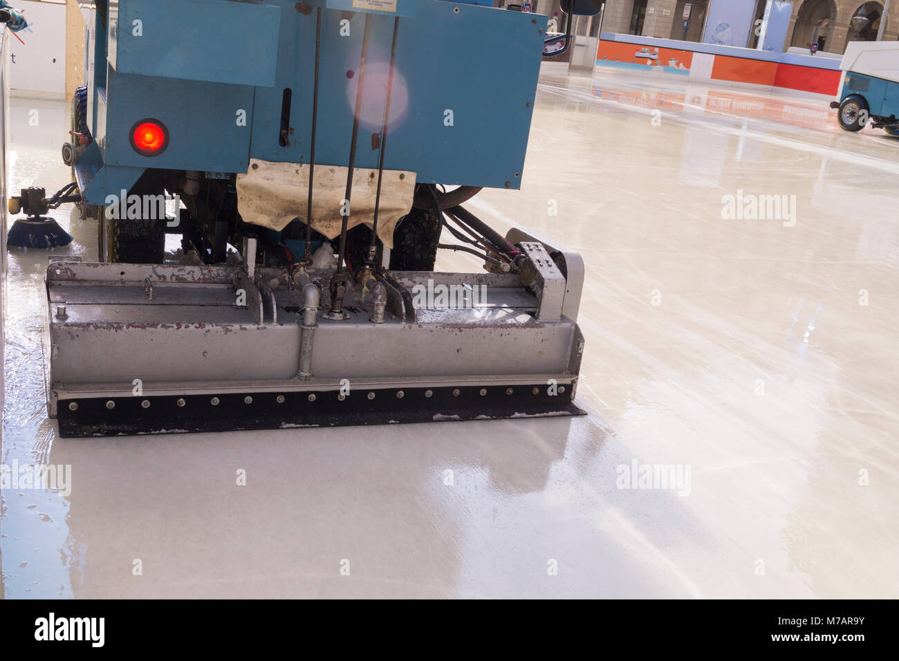 Zamboni cleaning ice for figure skating on sunny day Stock Photo Alamy