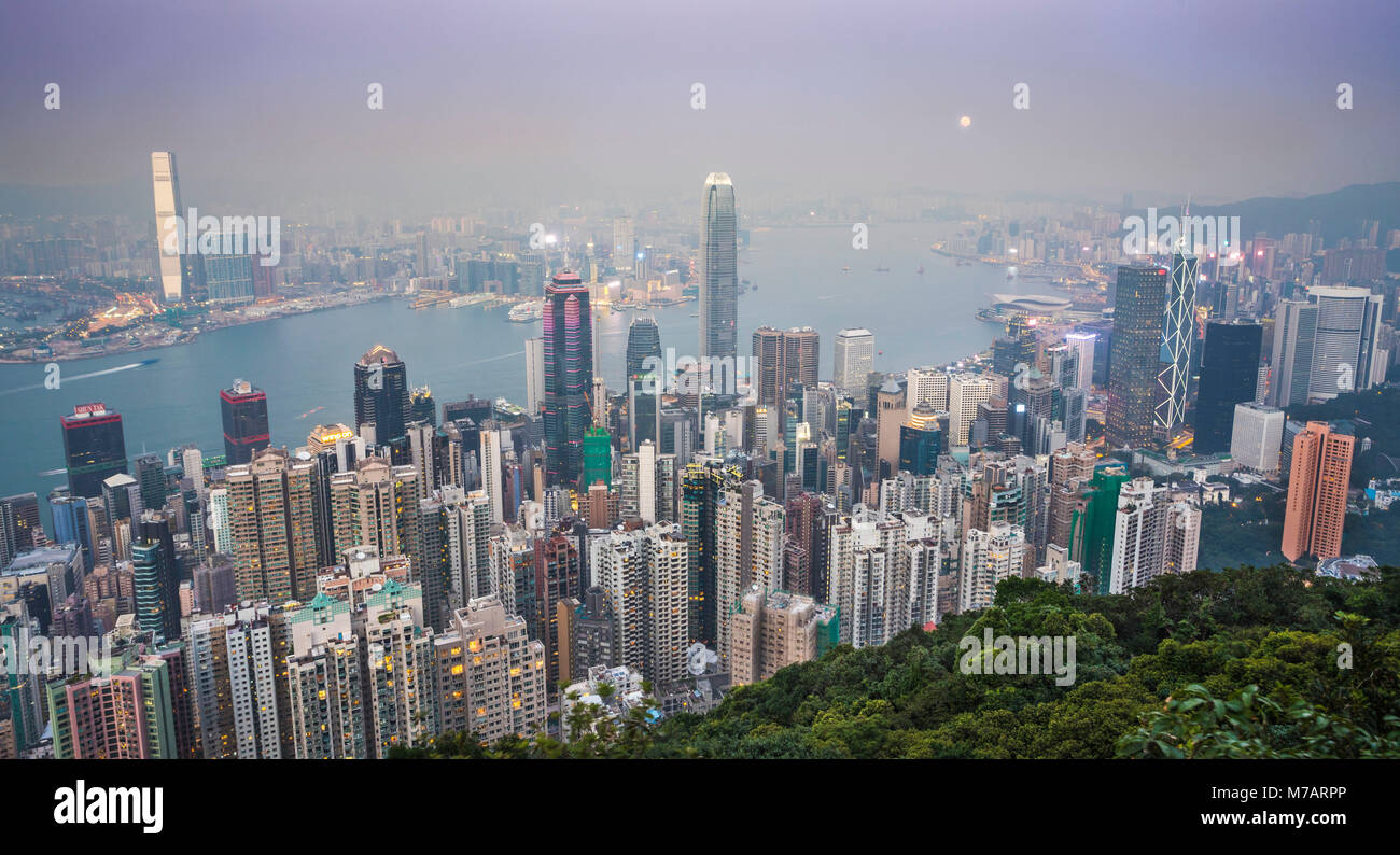 Hong Kong City, Victoria Island and Kowloon form Victoria Peak at sunset Stock Photo