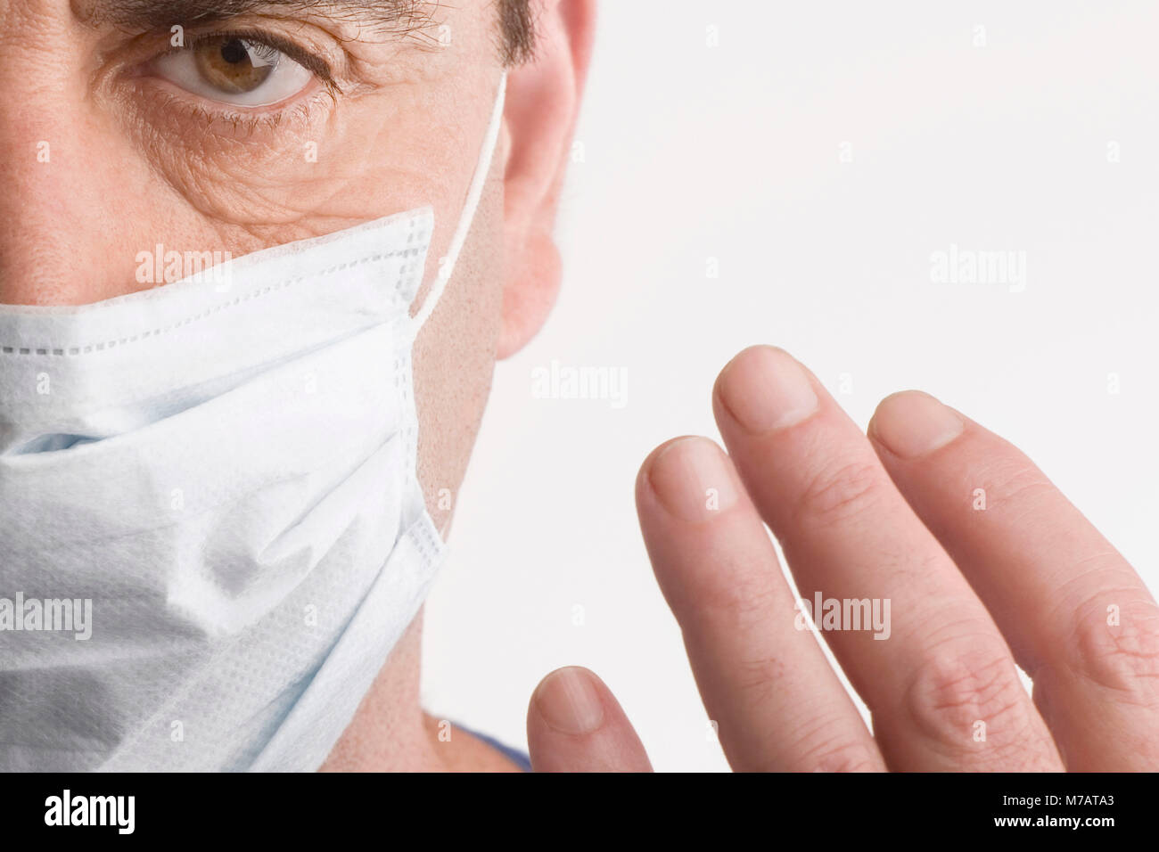 Portrait of a male surgeon wearing surgical mask Stock Photo - Alamy