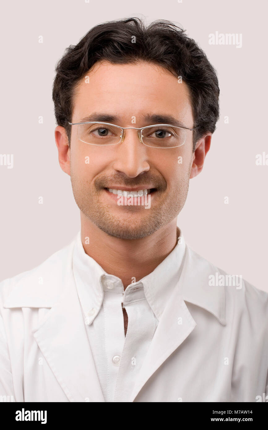 Portrait of a male doctor smiling Stock Photo - Alamy