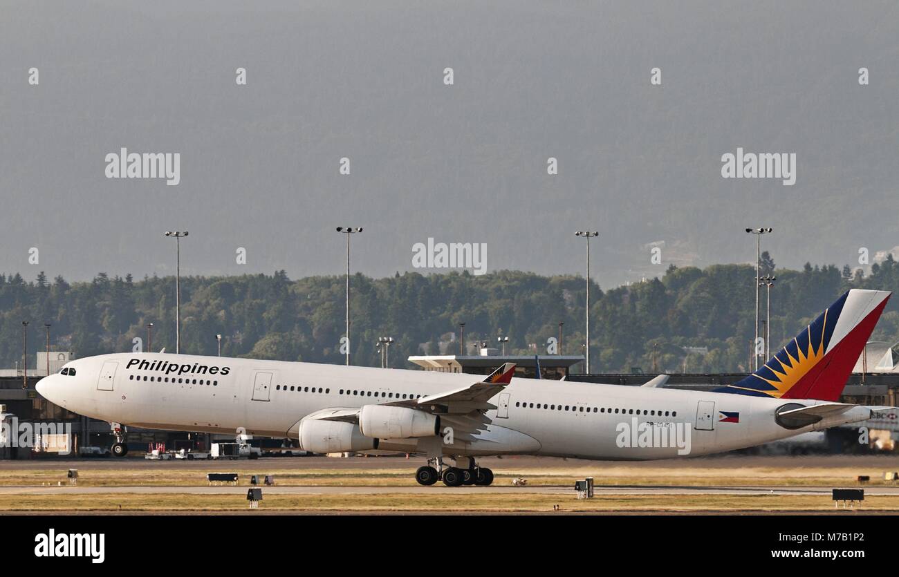 Richmond, British Columbia, Canada. 11th Aug, 2011. A Philippine Airlines Airbus A340 (A340-313X) jet airliner takes off from Vancouver International Airport. (Credit Image: © Bayne Stanley/ZUMApress.com) Stock Photo