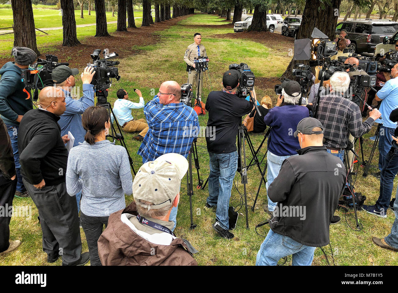 Yountville, California, USA. 9th Mar, 2018. Sgt. ROBERT NACKE, public information officer for the California Highway Patrol Golden Gate division, addresses the media during a press conference near the grounds of the California Veterans Home at Yountville. Law enforcement was responding to reports of an active shooter who was holding three people hostage at the facility. Credit: JL Sousa/Napa Valley Register/ZUMA Wire/Alamy Live News Stock Photo