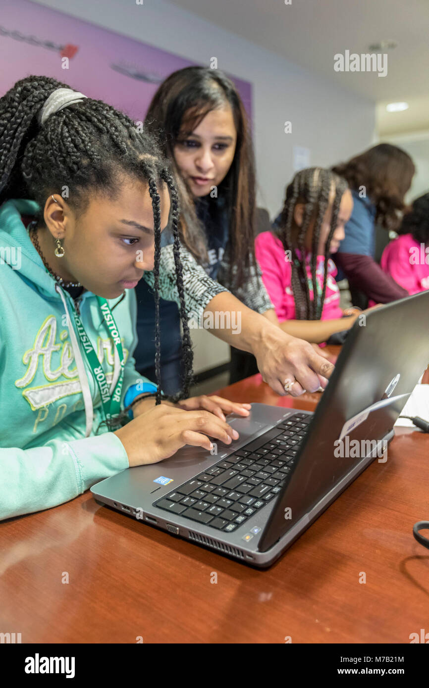 Auburn Hills, Michigan USA - 9 March 2018 - Middle school girls participate in technology day at Fiat Chrysler Automobiles' IT headquarters. A girl learned how to select the features and colors she wanted in a new car, using FCA's existing internet technology. Credit: Jim West/Alamy Live News Stock Photo