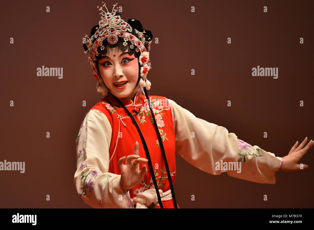 Hong Kong. 9th Mar, 2018. A performer from the Suzhou Kunqu Opera Theatre makes stage demonstration during a lecture titled 'Love and Beauty of Kunqu Opera' given by renowned writer Pai Hsien-yung at City University of Hong Kong in south China's Hong Kong Special Administrative Region, March 9, 2018. Pai is most famous for a number of fiction works including 'Taipei People' and 'Crystal Boys'. A great fan of the Chinese Kunqu Opera, he has also committed himself to preserving and promoting this traditional art form worldwide. Credit: Wang Xi/Xinhua/Alamy Live News Stock Photo