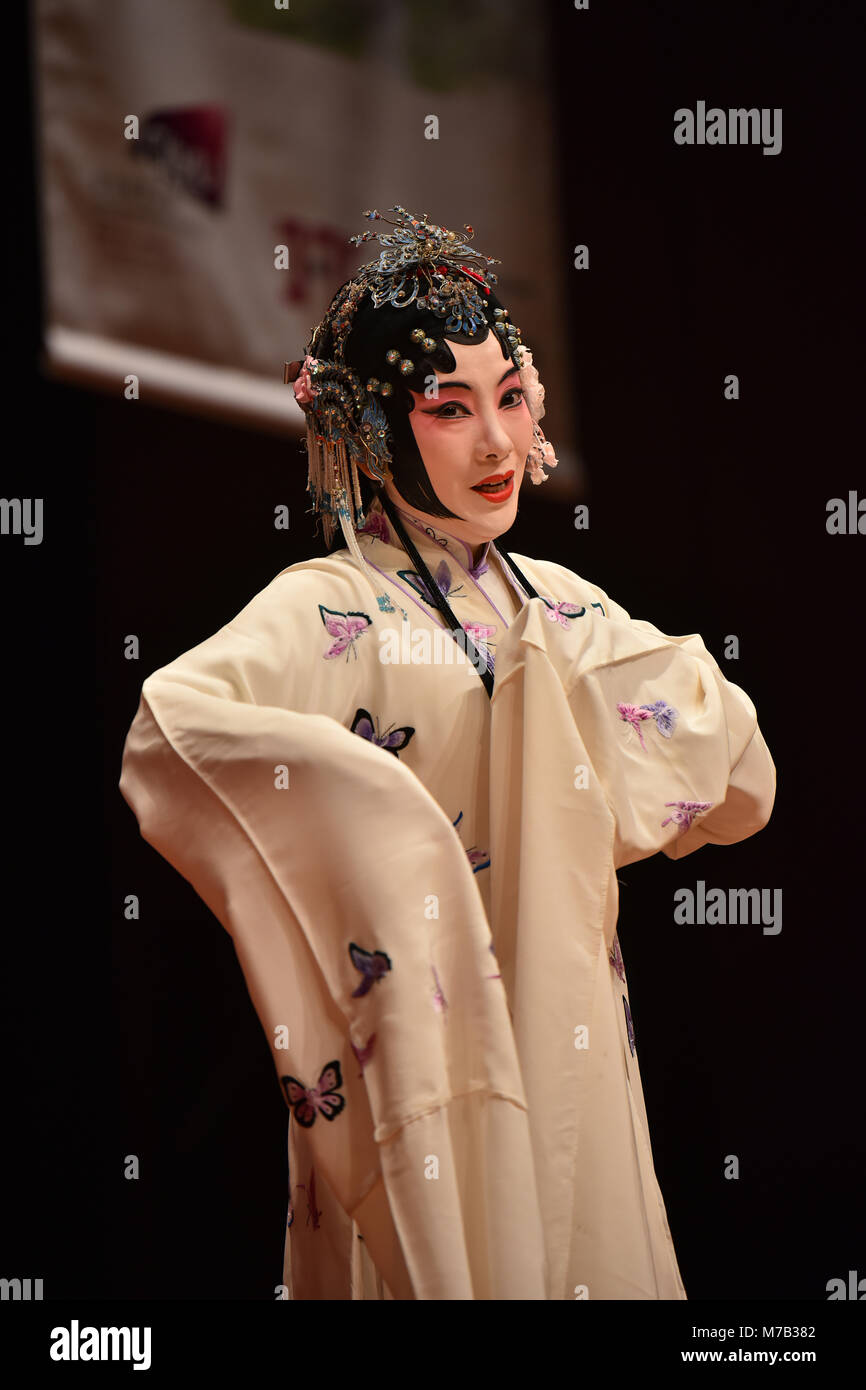 Hong Kong. 9th Mar, 2018. A performer from the Suzhou Kunqu Opera Theatre makes stage demonstration during a lecture titled 'Love and Beauty of Kunqu Opera' given by renowned writer Pai Hsien-yung at City University of Hong Kong in south China's Hong Kong Special Administrative Region, March 9, 2018. Pai is most famous for a number of fiction works including 'Taipei People' and 'Crystal Boys'. A great fan of the Chinese Kunqu Opera, he has also committed himself to preserving and promoting this traditional art form worldwide. Credit: Wang Xi/Xinhua/Alamy Live News Stock Photo