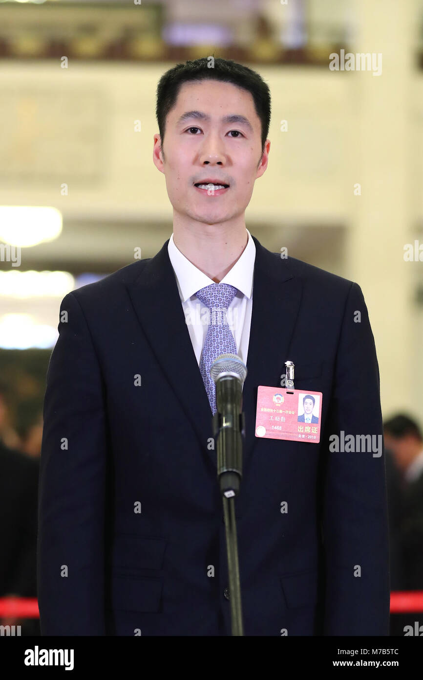 Beijing, China. 10th Mar, 2018. Wang Liqin, a member of the 13th National Committee of the Chinese People's Political Consultative Conference (CPPCC), receives an interview ahead of the third plenary meeting of the first session of the 13th CPPCC National Committee at the Great Hall of the People in Beijing, capital of China, March 10, 2018. Credit: Zhang Yuwei/Xinhua/Alamy Live News Stock Photo