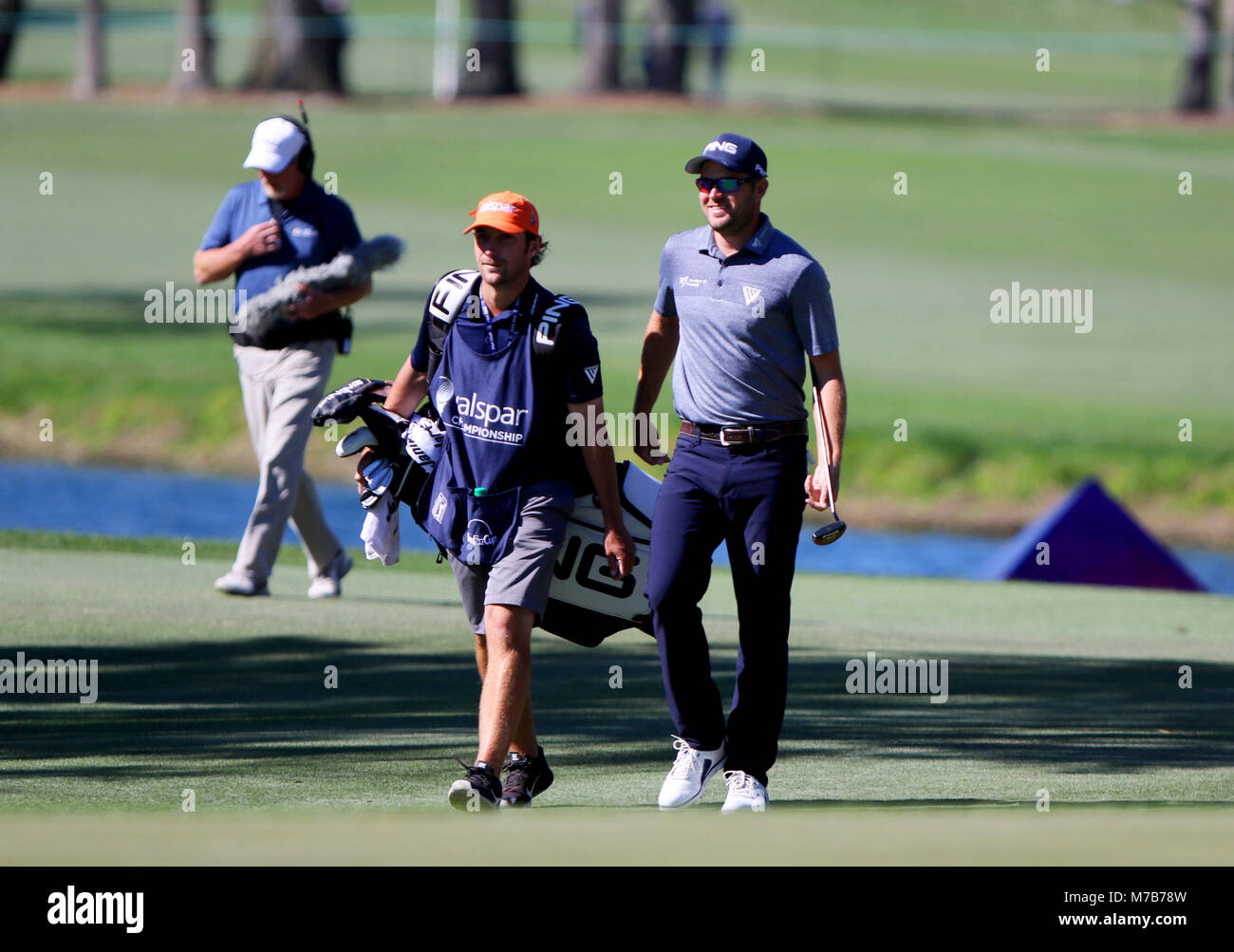March 9, 2018 - Palm Harbor, Florida, U.S. - DOUGLAS R. CLIFFORD   |   Times.Corey Conners arrives at the 16th green while playing the Copperhead Course on Friday (3/9/18) during the second round of the Valspar Championship at the Innisbrook Golf and Spa Resort in Palm Harbor (Credit Image: © Douglas R. Clifford/Tampa Bay Times via ZUMA Wire) Stock Photo