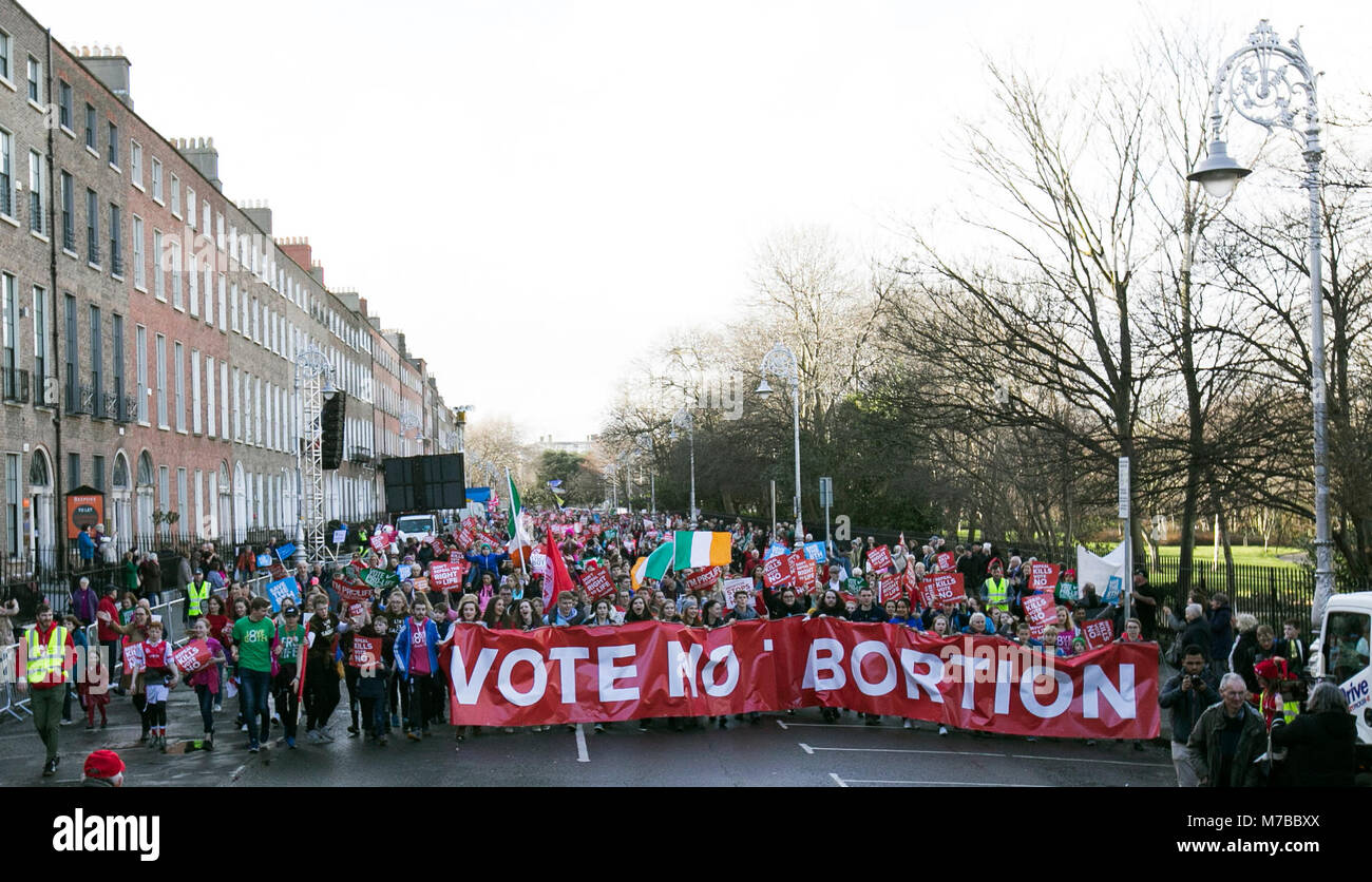 Dubin, Ireland. 10th Mar, 2018. Anti Abortion Rally, Dublin Ireland. Pro Life supporters march through Dublin city today, on their way  to Leinster House (Dail/Parliament), for a mass meeting on the streets. Tens of thousands are expected at the rally, which is in opposition to the Irish Governments proposal to hold a referendum to repeal the  Eight Amendment of the Constitution, which prohibits abortion and replace it with a law would would allow pregnant women to access abortion services. Photo: Sam Boal/RollingNews.ie Credit: RollingNews.ie/Alamy Live News Stock Photo