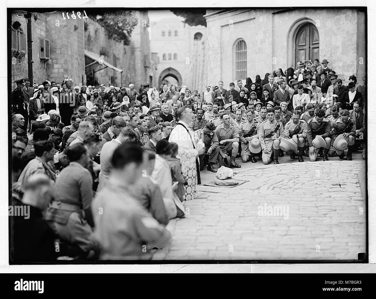 This photograph captures the Good Friday procession on the Via Dolorosa ...