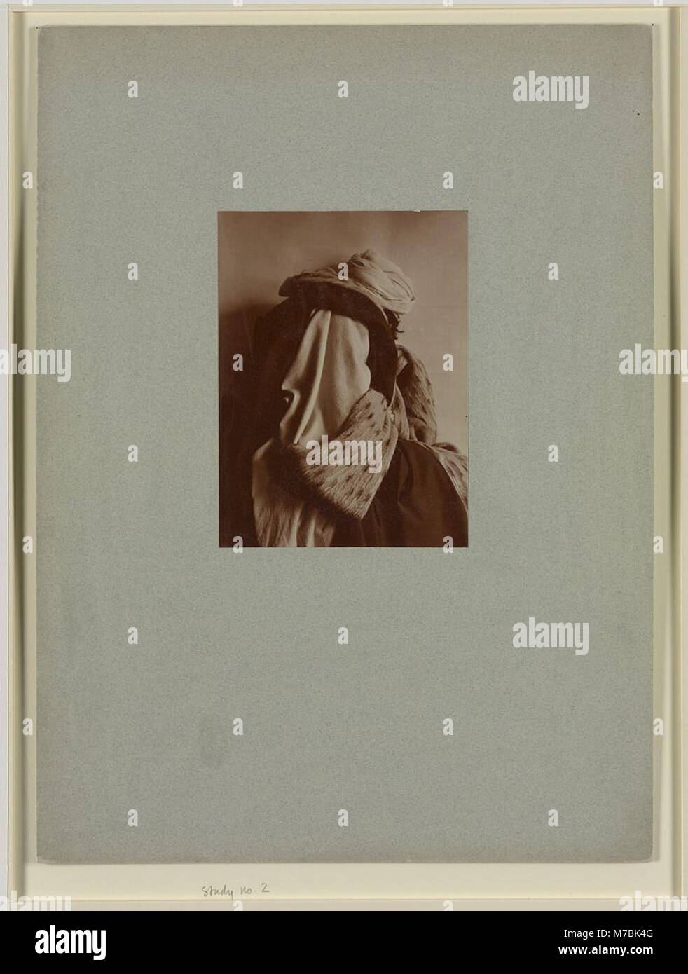 This image features an individual dressed in elaborate attire ...