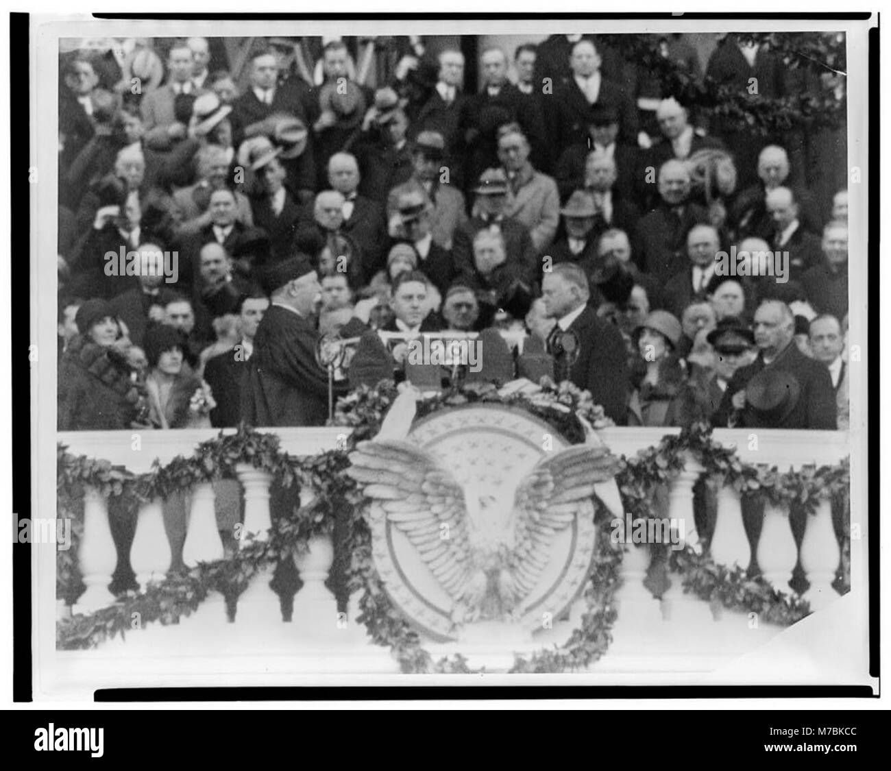 A photograph of Chief Justice William H. Taft administering the oath of ...