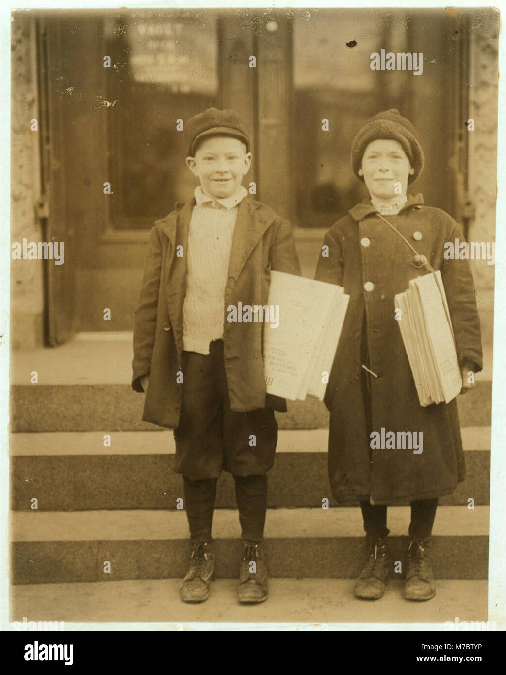 3 P.M. Teddy and Lester (on right) - both 9 yrs. old - and sell until 8 P.M. LOC nclc.03818 Stock Photo
