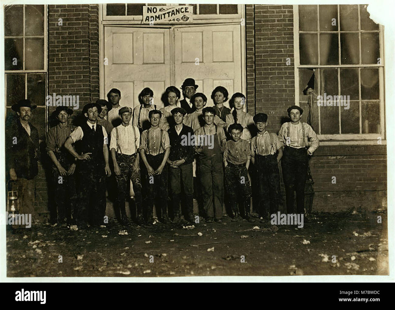 A few of the hands on the night shift in Highland Park Mill No. 3, Charlotte, N.C. 10-30 P.M. January 7-09. 100 hands in all. Ten children as small as smallest in photo to some smaller. One LOC nclc.01577 Stock Photo