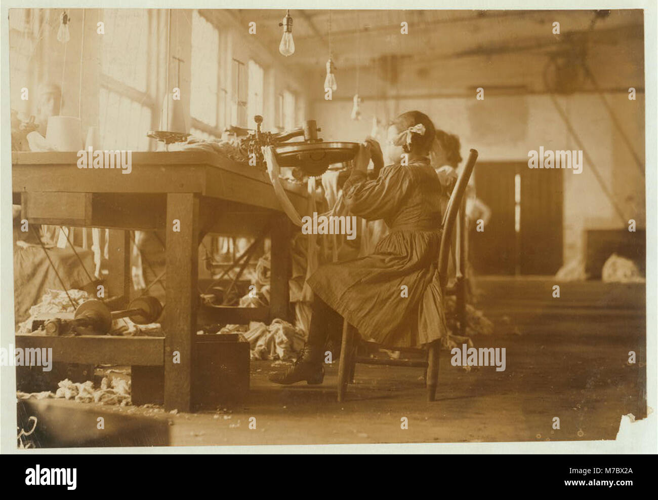 A young raveler in London Hosiery Mills. LOC cph.3a20811 Stock Photo