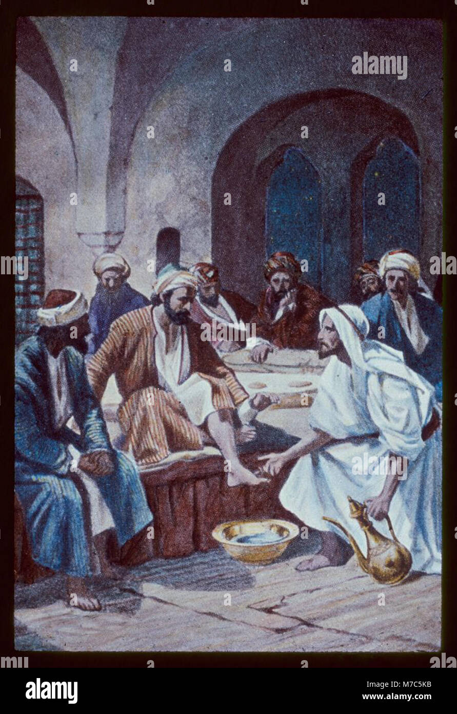 John 13-1-10. Jesus, with the twelve, partaketh of the passover feast in an upper chamber. He teacheth humility by washing the disciples' feet LOC matpc.23138 Stock Photo