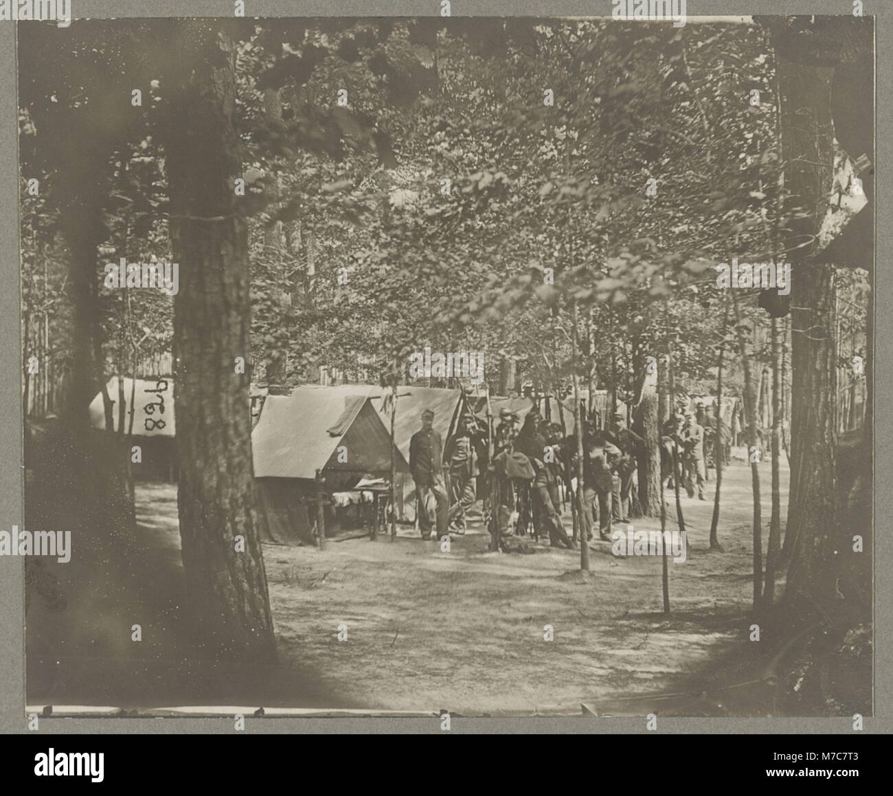 A photograph depicting the camps of Companies C & D from the 1st Massachusetts Cavalry in front of Petersburg, Virginia, during the Civil War in August 1864. Stock Photo