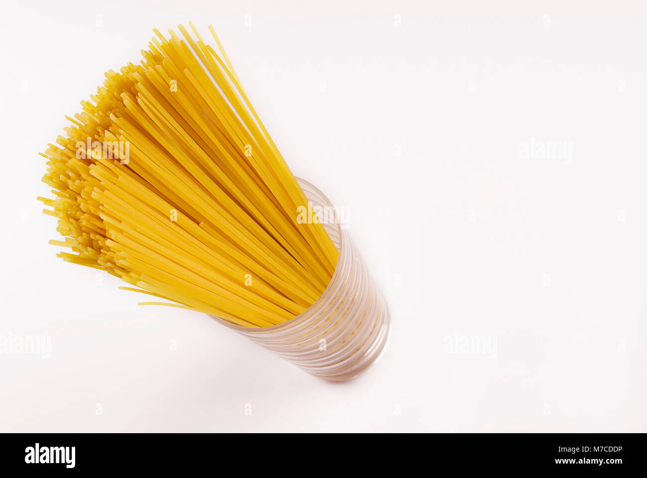 Spaghetti Object High angle view of raw spaghetti in a glass Stock Photo - Alamy