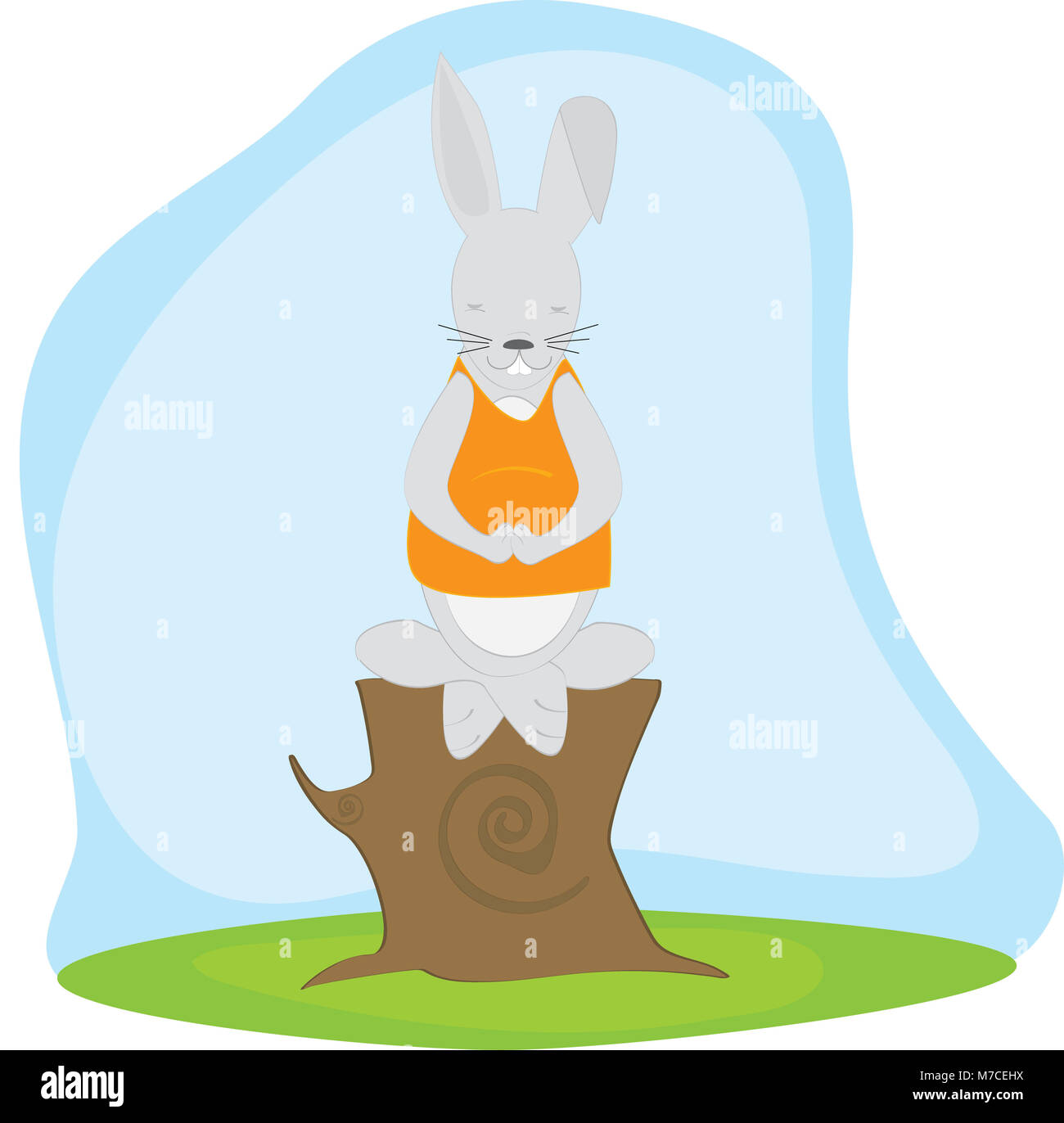 Rabbit doing meditation on a tree stump Stock Photo