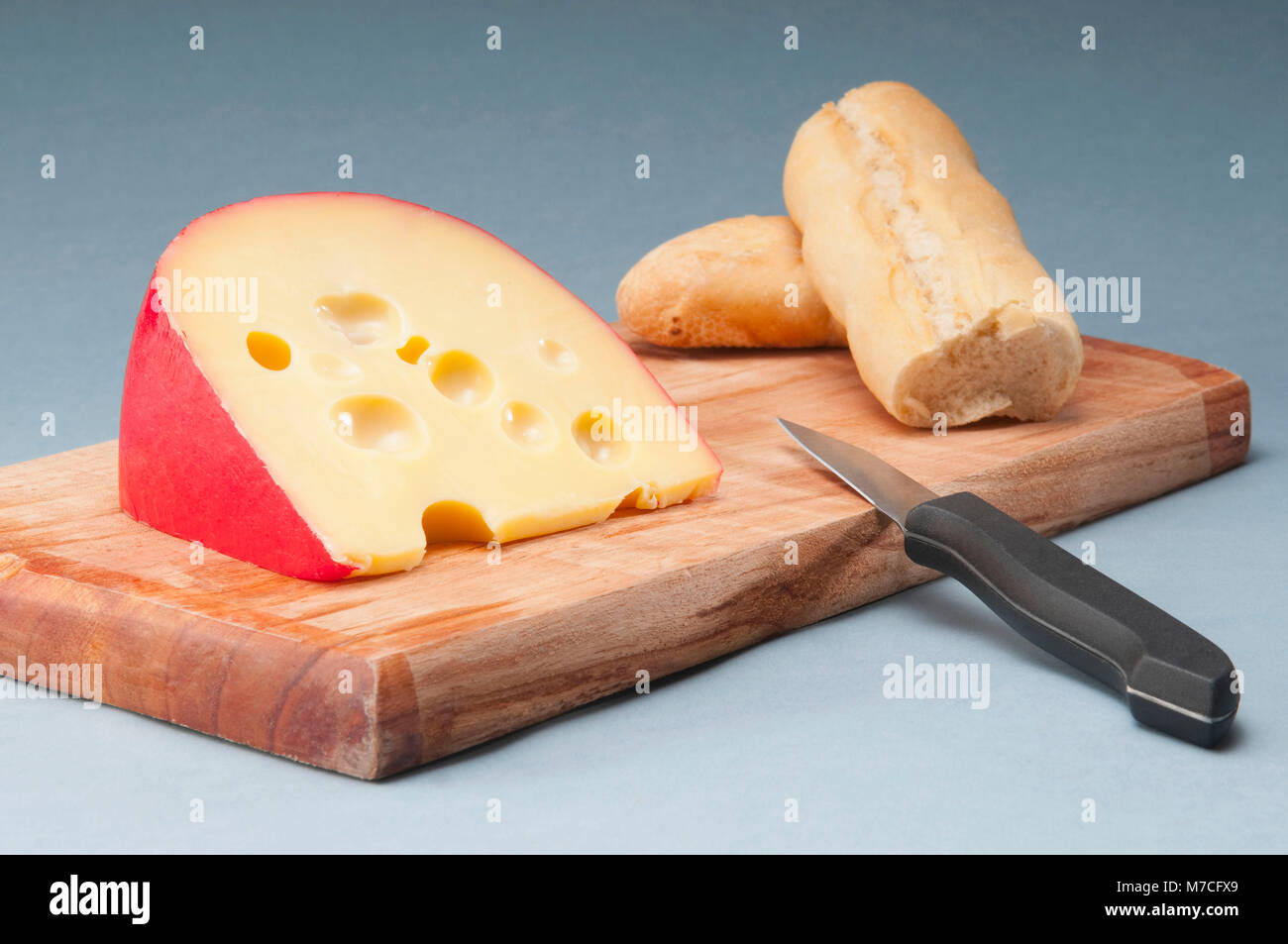 Edam cheese with crusty bread Stock Photo