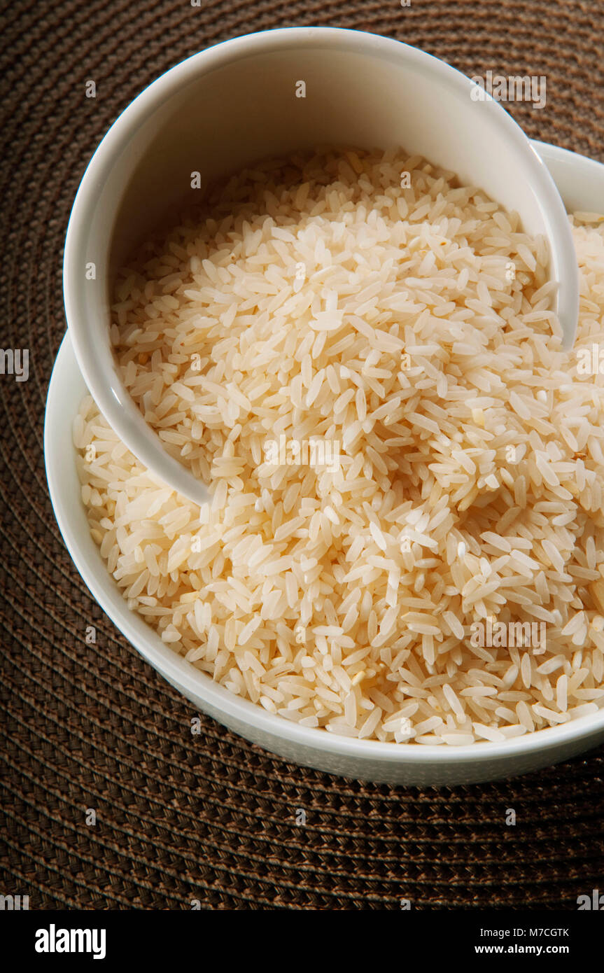Close up of brown rice in ceramic bowls hi-res stock photography and ...