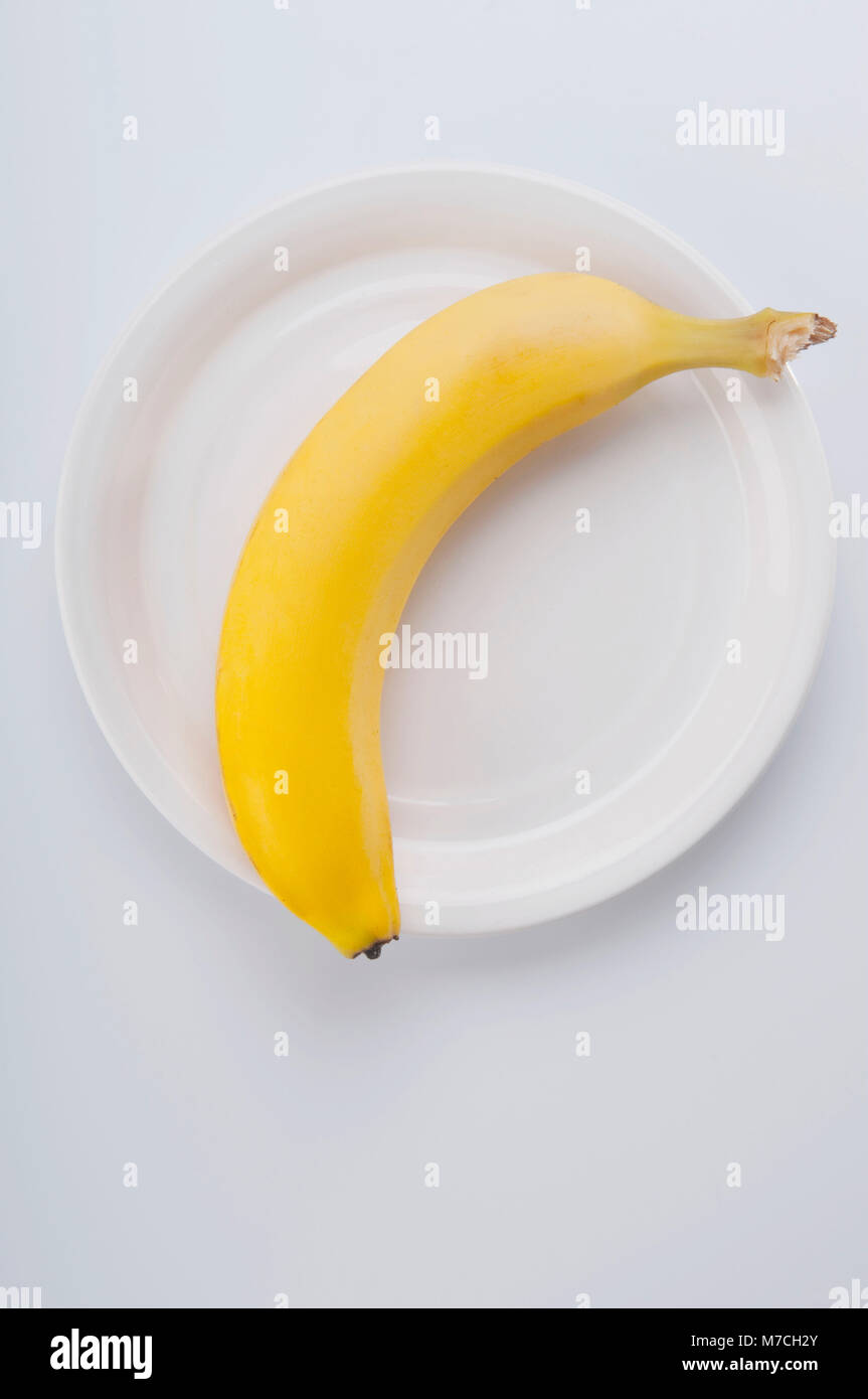 Download High Angle View Of A Banana On A Plate Stock Photo Alamy PSD Mockup Templates
