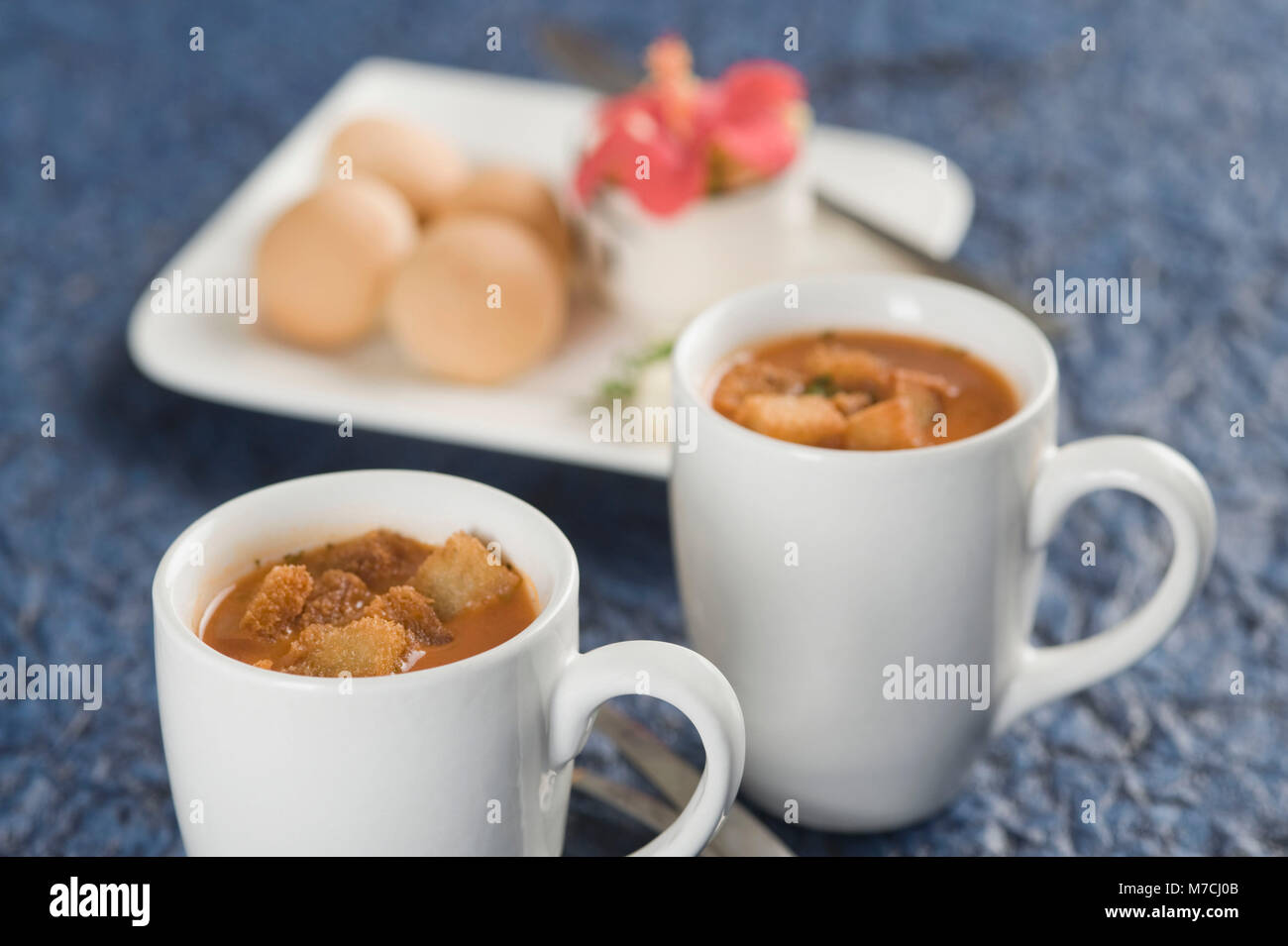 Two cups of tomato soup with bread cubes Stock Photo Alamy