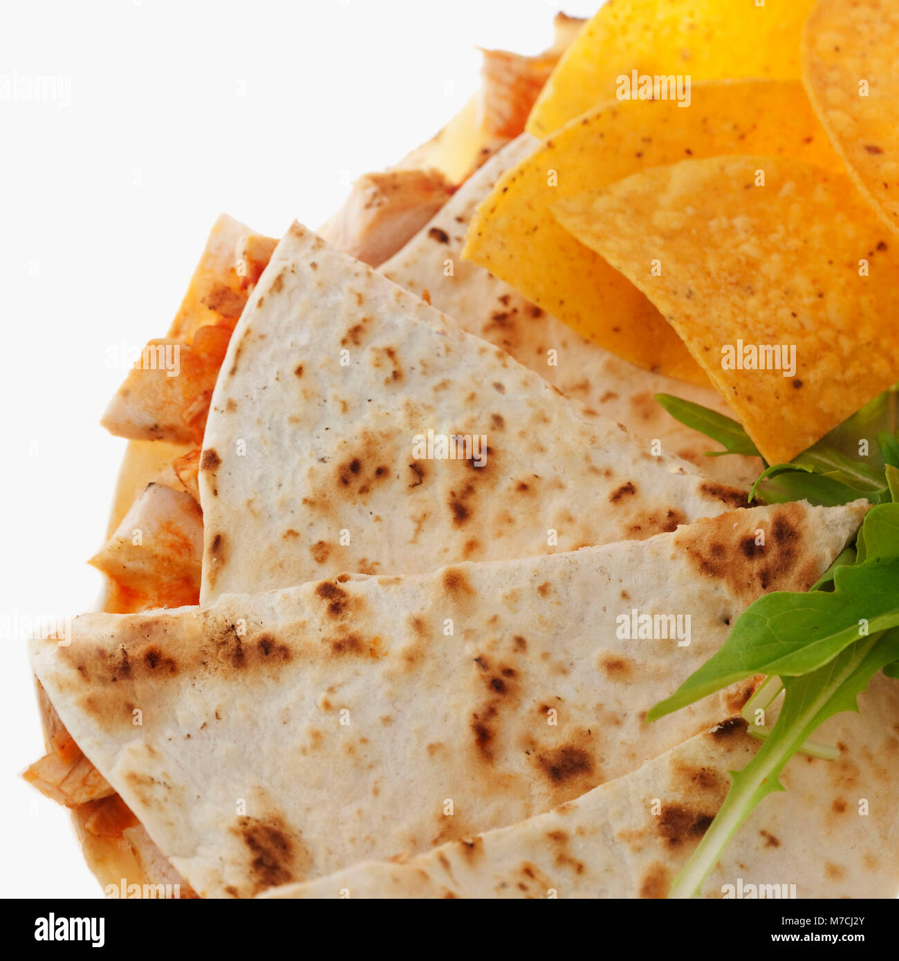 Close-up of quesadilla slices and nachos Stock Photo