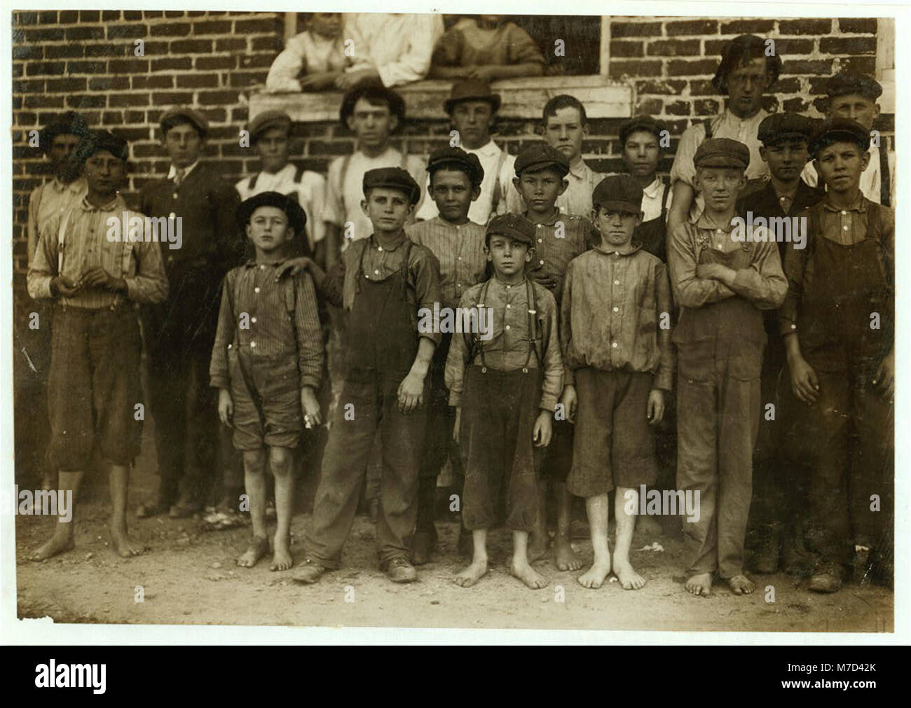 Groups of workers in Clayton (N.C.) Cotton Mills. Every one went in to work when whistle blew, and I saw most of them at work during the morning when I went through. Mr. W.H. Swift talked LOC nclc.02686 Stock Photo
