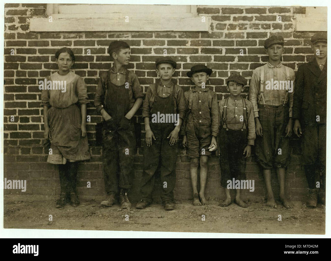 Groups of workers in Clayton (N.C.) Cotton Mills. Every one went in to work when whistle blew, and I saw most of them at work during the morning when I went through. Mr. W.H. Swift talked LOC nclc.02687 Stock Photo