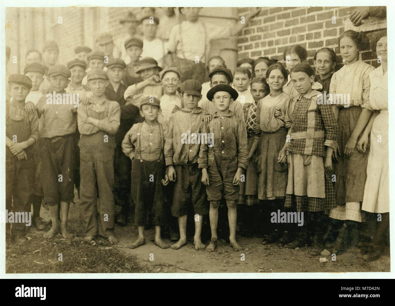 Groups of workers in Clayton (N.C.) Cotton Mills. Every one went in to work when whistle blew, and I saw most of them at work during the morning when I went through. Mr. W.H. Swift talked LOC nclc.02688 Stock Photo