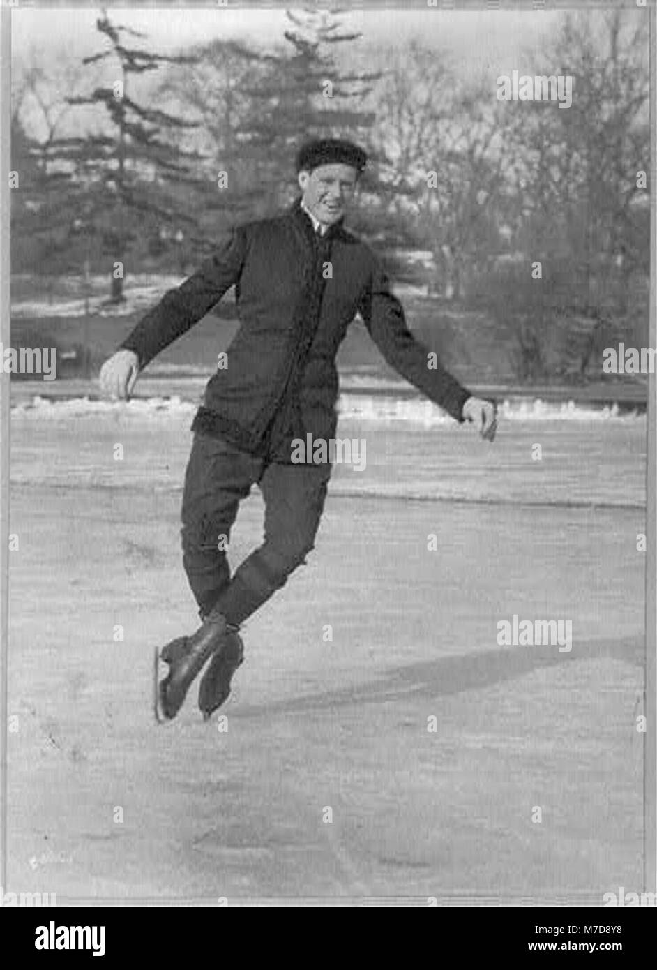 Irving Brokaw ice skating- doing a double toe pirouette on Central Park Lake LCCN2002715675 Stock Photo