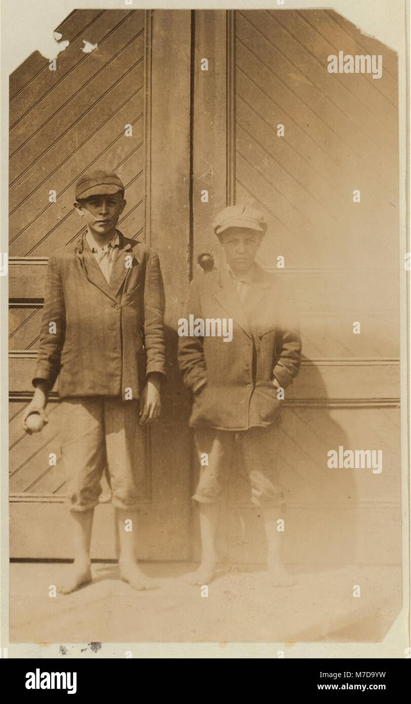 James Boulware, doffer in Manchester Mill, Rock Hill, said 13 years, working off and on 3 years. Charlie Rhoades, 12 years old, one year working, 75 cents a day. Couldn't write his name. LOC nclc.02534 Stock Photo