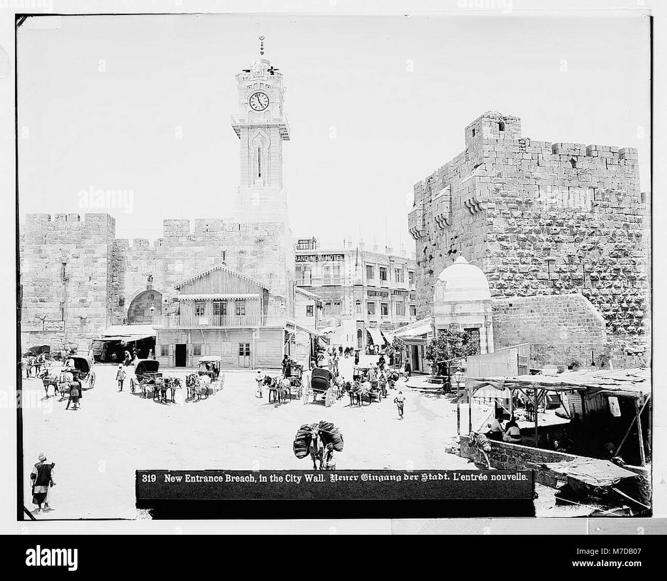 An image of the new entrance to Jerusalem, with a visible breach in the city wall, highlighting the city's historical and strategic changes over time. Stock Photo
