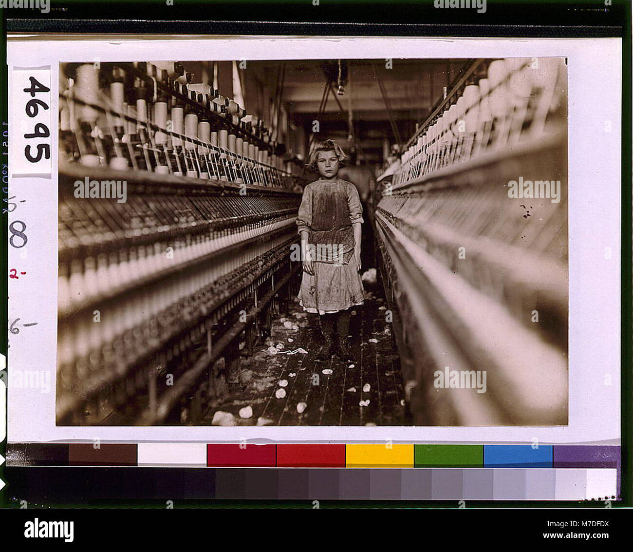 Little spinner in Globe Cotton Mill, Augusta, Ga. Overseer said she was